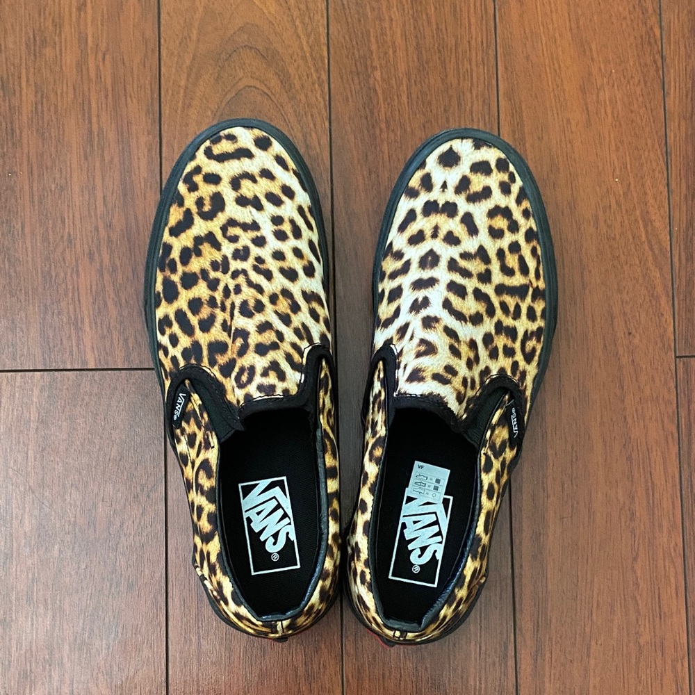 Vans Slip-On Sneakers in Leopard Print with Black Trim